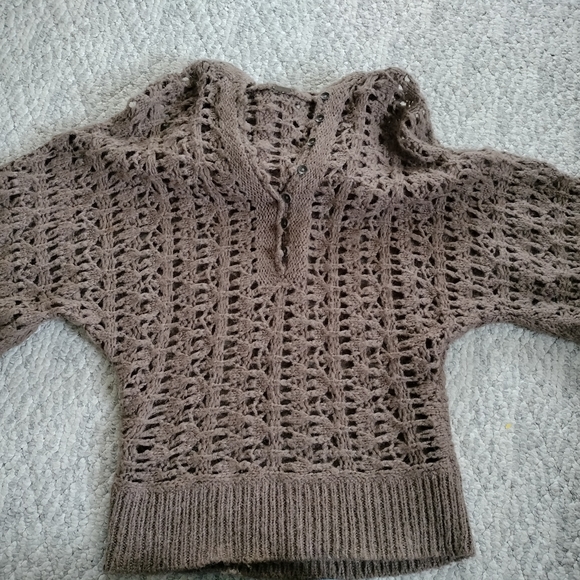 This is a Free People Pointelle Open Knit Alpaca Hooded Sweater in brown. Small - Picture 10 of 13